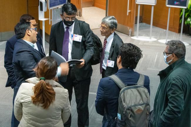 Delegates confer