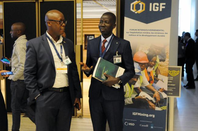 Delegates confer