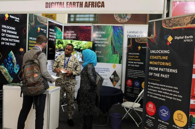Participants at the Digital Earth Africa stand