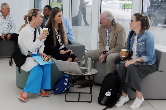 Participants enjoy a coffee break