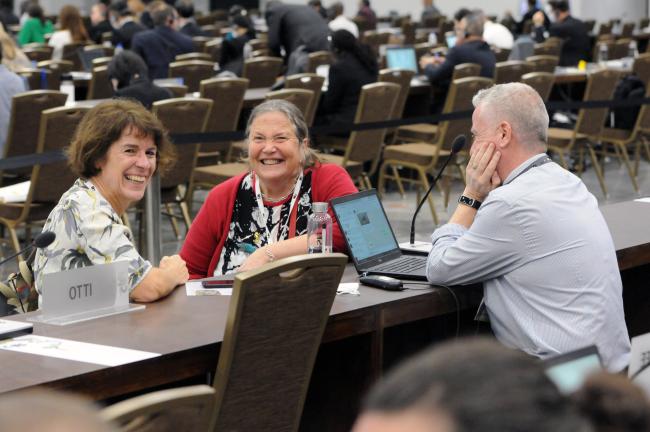 Participants share a laugh during a break