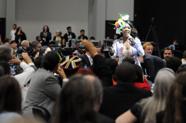 A singer performs following the welcoming speeches