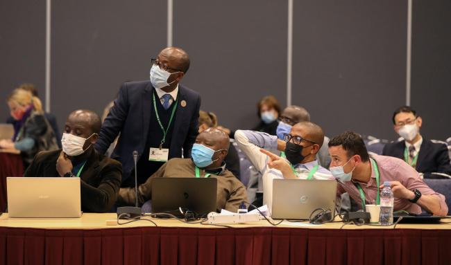 Delegates conferring during a contact group on the Post-2020 Global Biodiversity Framework