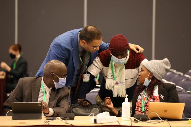 Delegates from Africa conferring during a contact group on the GBF