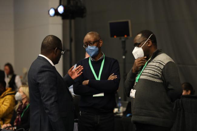 Delegates speak informally