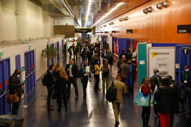 Delegates gather outside the halls of the Rio Conventions Pavilion