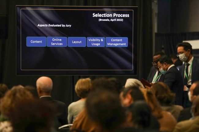 The criteria for the award selection is shown on screen