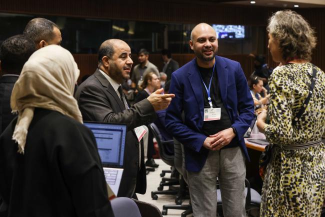 Delegates from Saudi Arabia talk to OEWG Chair Gudi Alkemade, Netherlands_OEWG1.2_2feb2023_photo.jpg