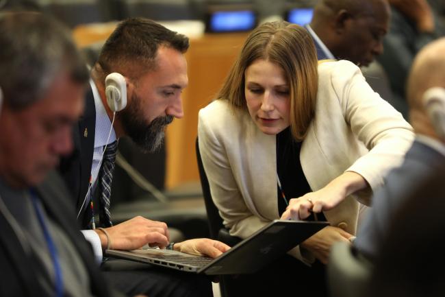 Delegates from Canada conferring