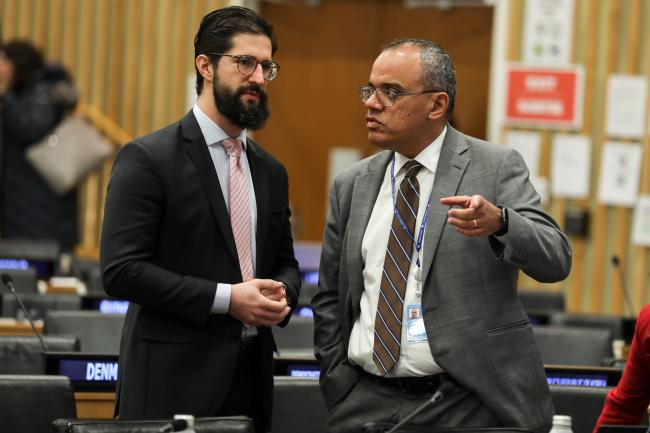 Delegates from Brazil conferring during a break