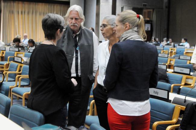 Participants confer
