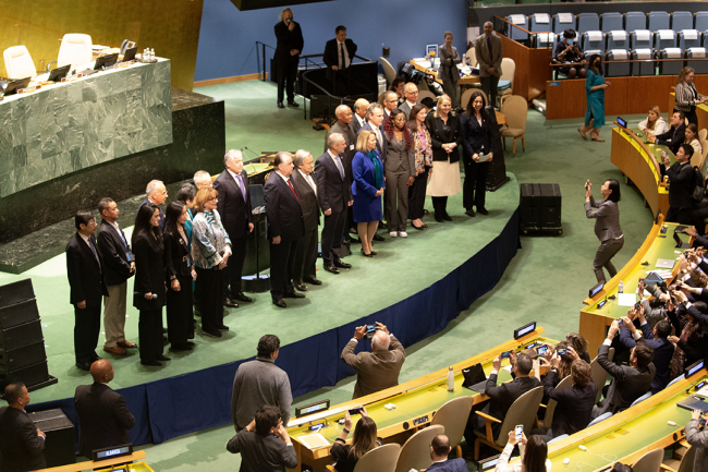 Pose for a group picture at the closing ceremony