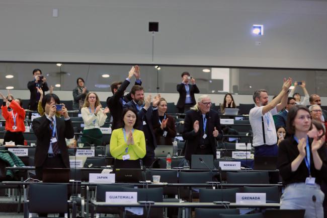 Delegates celebrating the approval of the Summary for the Policymakers