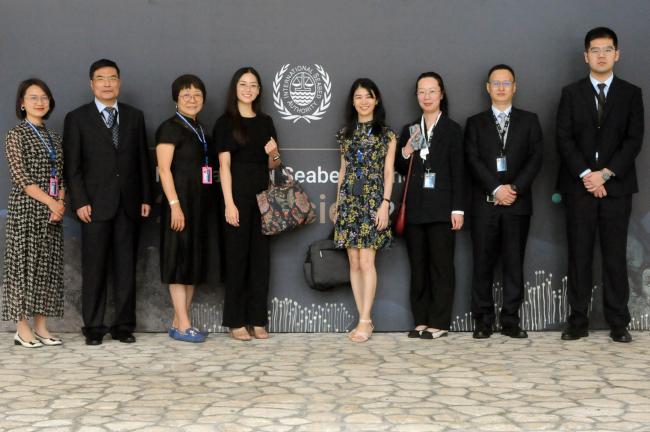 Delegates from China and Singapore