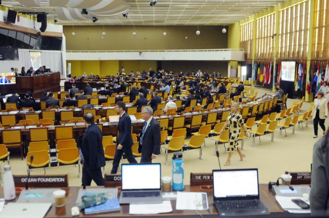 Delegates leave the room as the Russian Federation addresses the Council
