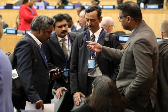 Delegates from India during a break between informal negotiations