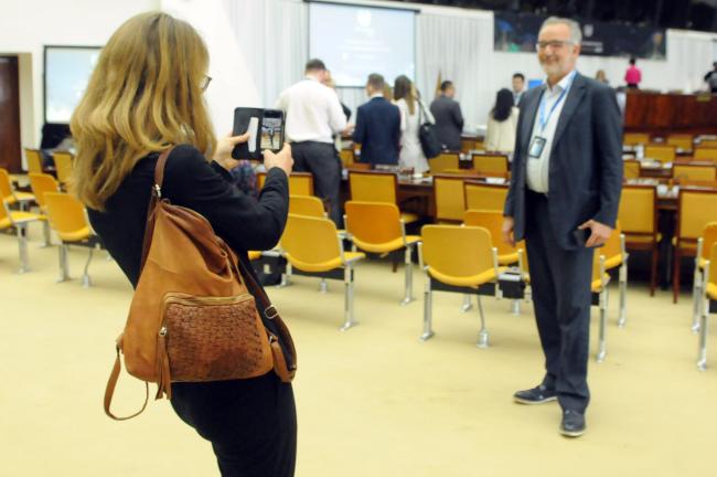 Laura Platchkov, Switzerland, takes a photo