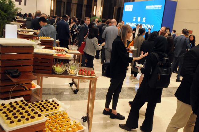 Participants during a reception following the opening ceremony