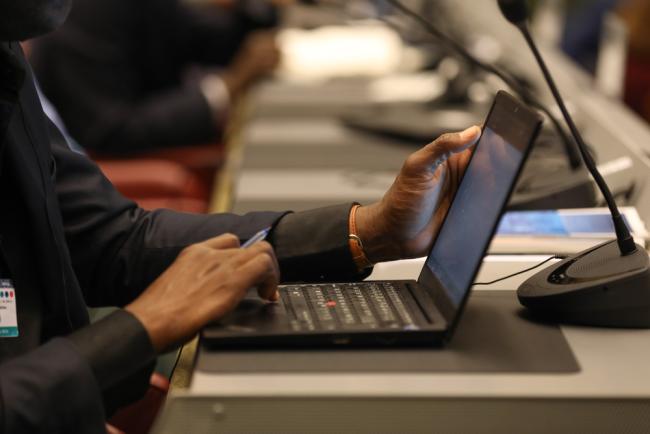 Delegate takes notes