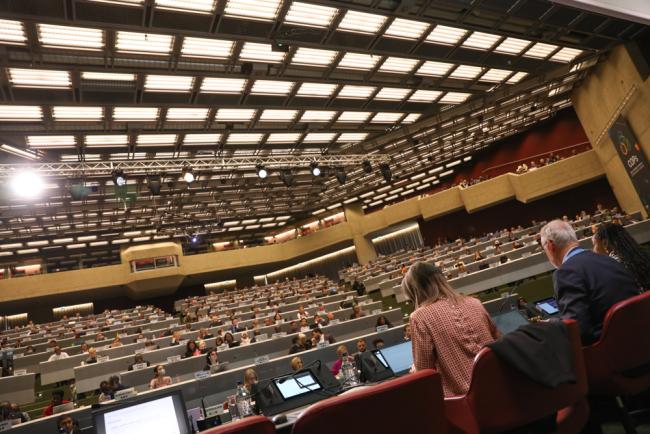 Delegates gather for the start of morning plenary