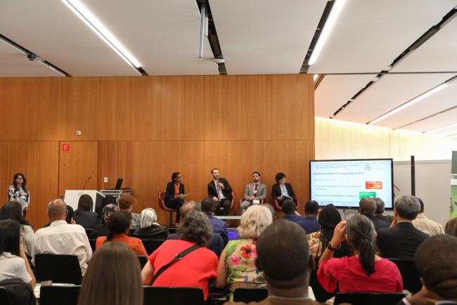 Delegates listen to a variety of panel speakers to discuss the importance of eliminating PCBs