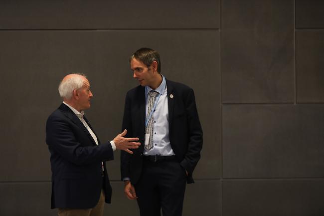 Harry Vreuls, SBSTA Chair, speaks with Andrew Ferrone, Luxembourg