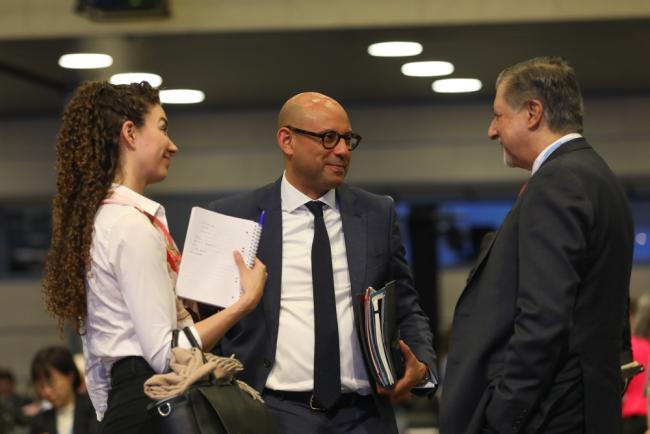 UNFCCC Executive Secretary Simon Stiell speaks with Adnan Amin, COP 28 Presidency