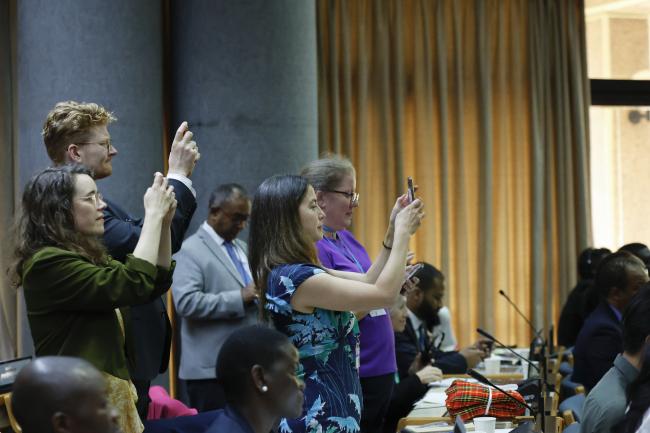 Delegates taking photos of the elections' results 