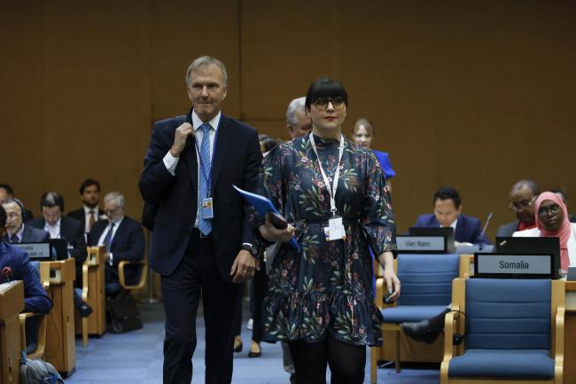 Delegates walking into the opening plenary 