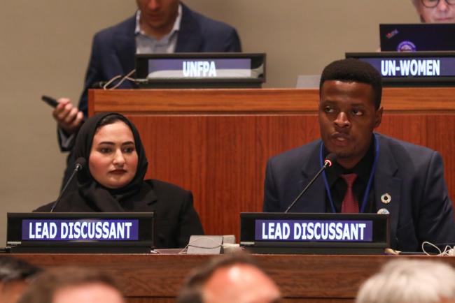 Rwodah Al-Naimi, Qatar Fund for Development, and Humphrey Mrema, Youth Survival Organization and Youth4Climate Advisory Committee