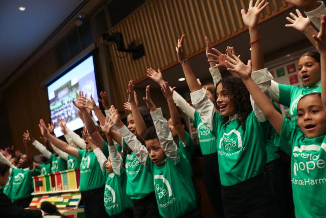 During the closing of HLPF 2023, children from 'Sing for Hope' perform a song in plenary