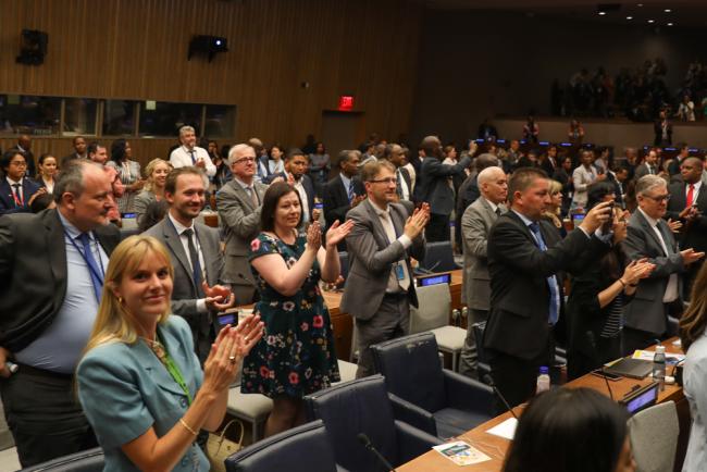 Delegates give the performs a standing ovation