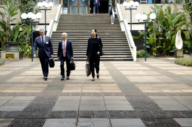 IPCC Chair Hoesung Lee walking into the plenary