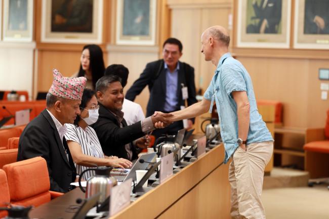 Participants arriving for the start of the Working Group