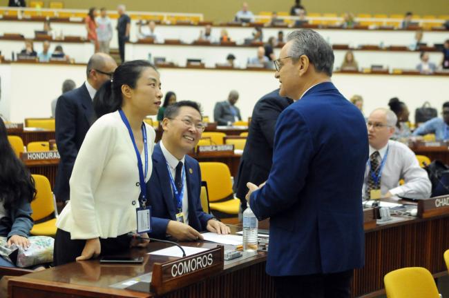 Wenting Zhao and Chen Daojiang, China, with Olivier Guyonvarch, France