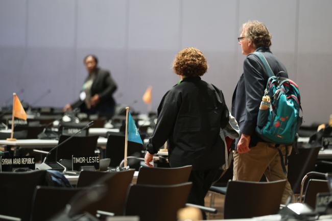 Delegates walking into the room for the morning session