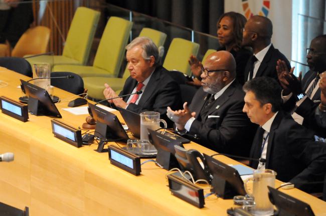 Dennis Francis, Trinidad and Tobago, President of the 78th General Assembly, and António Guterres, UN Secretary-General, applaud at the end of the 2023 SDG Summit