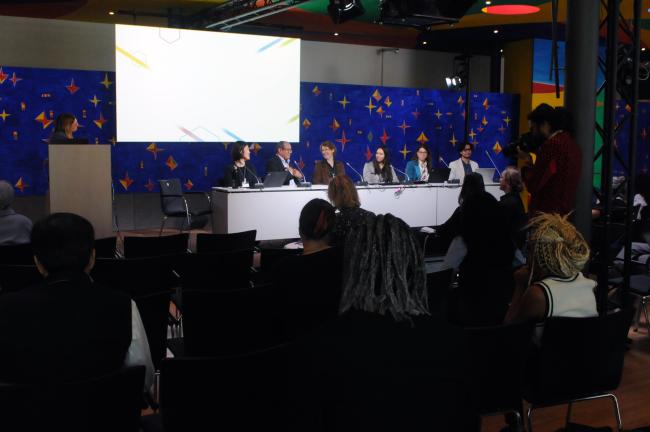 Participants follow the discussions during the Intergenerational Dialogue