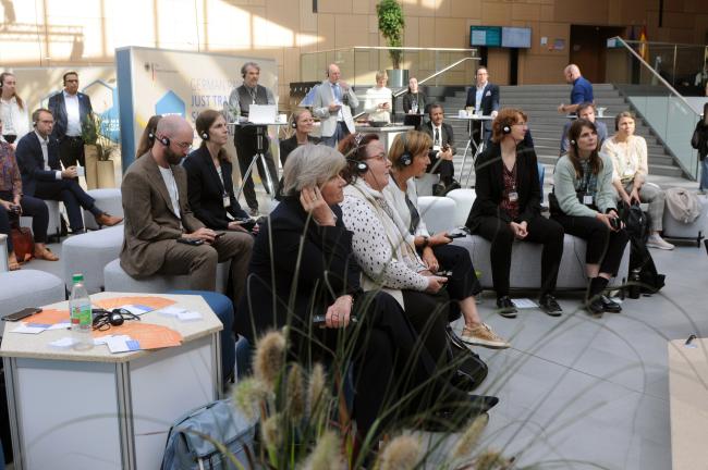 Participants listen to Marike Kolossa-Gehring, German Environment Agency