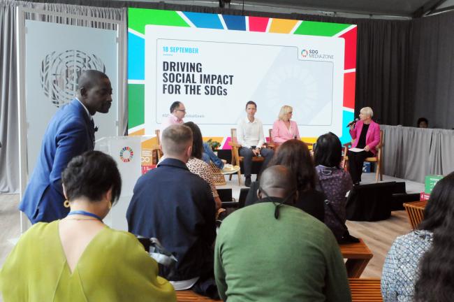 Participants attend events being held at the SDG Media Zone