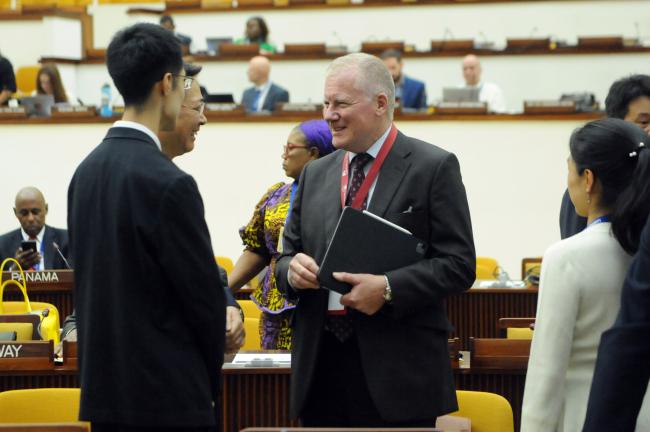 Chinese delegates and Michael Lodge, ISA Secretary General