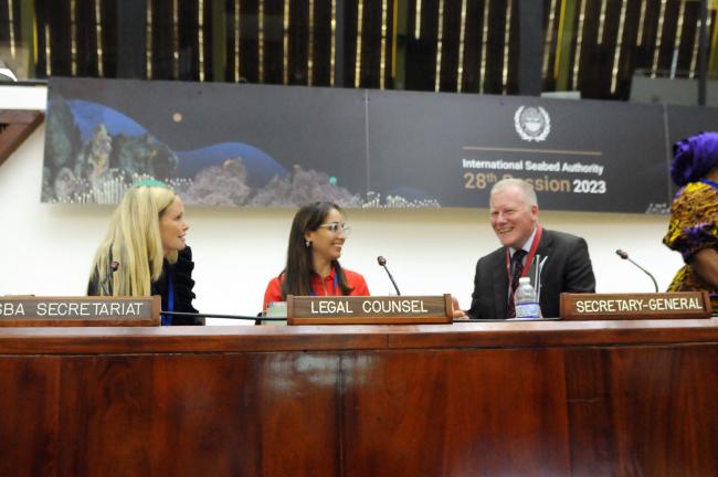 (L-R) Lea Kolmos Weis and Mariana Durney, ISA Secretariat, with Michael Lodge, ISA Secretary-General