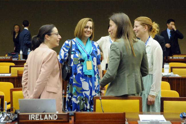 Delegates confer