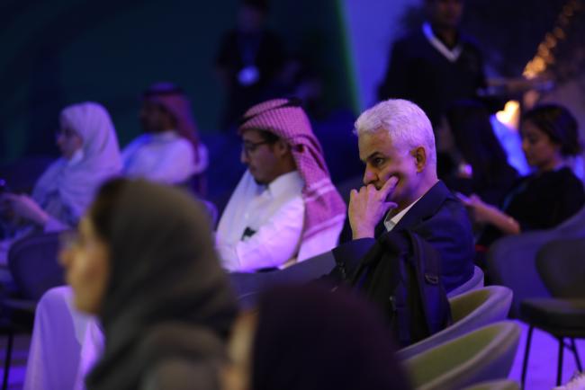 Participants listen to the discussions
