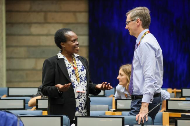 Margaret Aanyu, Uganda, with John Thompson, US