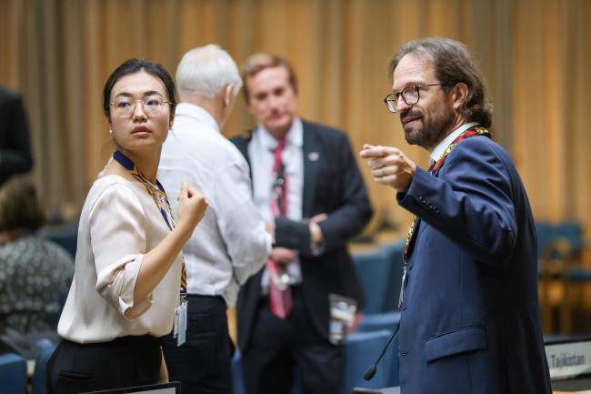 Yiwei Zou, Ozone Secretariat, and Henry Wohrnschimmel, Switzerland