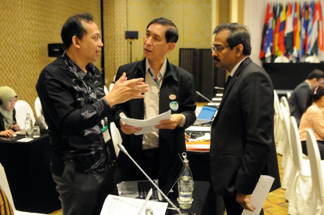 Delegates confer