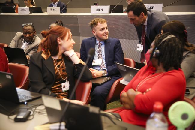Delegates from the UK and Switzerland in discussion - MinamataCOP5 - 1Nov2023 – Photo.jpg