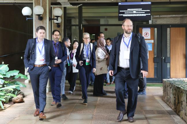 Delegates leaving the Contact Group room for lunch break