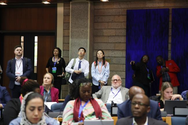 Following the session from the back of the room
